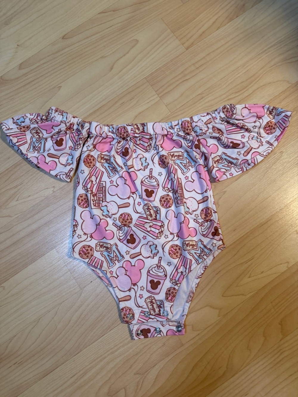 Magical Treats Off-Shoulder Onesie